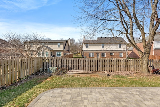 view of yard featuring a fenced backyard