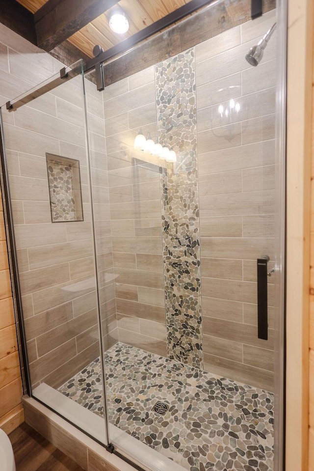 bathroom with a stall shower