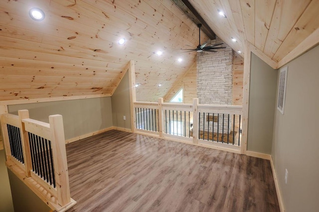 bonus room featuring wood ceiling, lofted ceiling with beams, baseboards, and wood finished floors