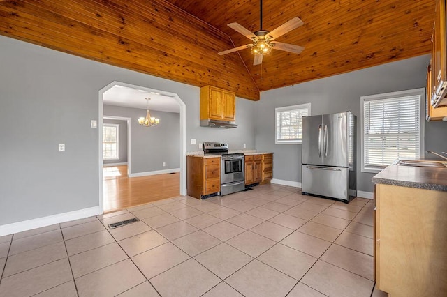 kitchen with light tile patterned floors, stainless steel appliances, visible vents, a healthy amount of sunlight, and a sink