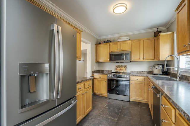 kitchen featuring dark tile patterned flooring, dark countertops, stainless steel appliances, crown molding, and a sink