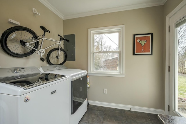 clothes washing area with crown molding, electric panel, independent washer and dryer, and baseboards