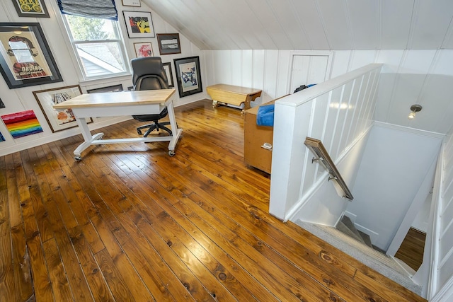 office space with lofted ceiling and wood-type flooring