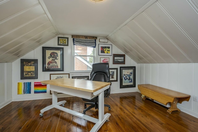 home office featuring lofted ceiling, baseboards, and hardwood / wood-style floors