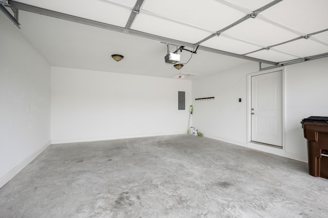 garage with electric panel, baseboards, and a garage door opener