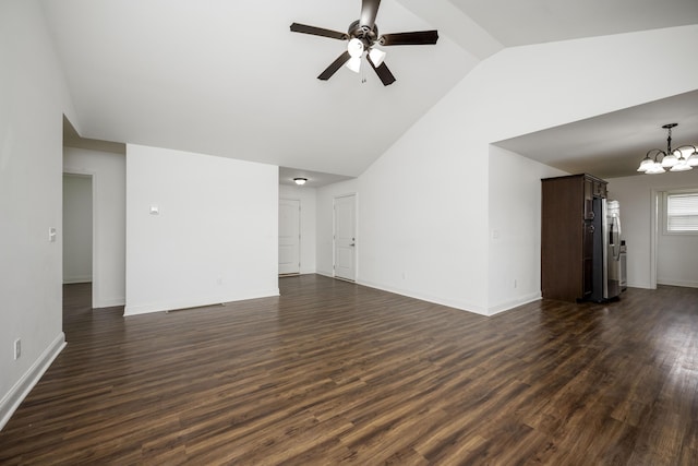 unfurnished living room with dark wood-style floors, baseboards, and ceiling fan with notable chandelier