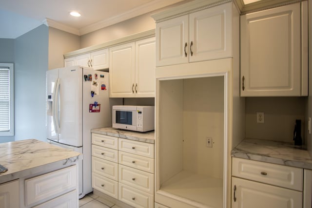 kitchen with white appliances, light stone countertops, crown molding, white cabinetry, and recessed lighting