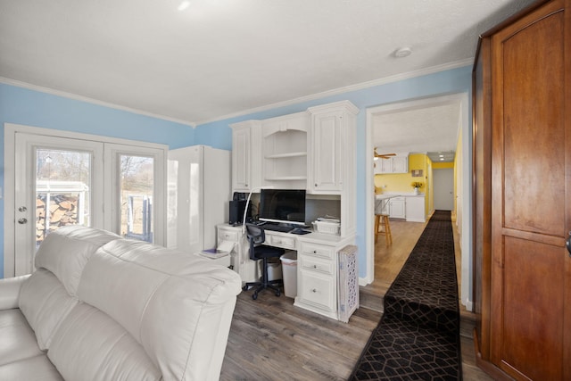 office area featuring dark wood finished floors and crown molding