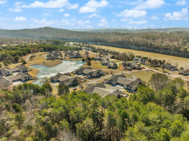 aerial view featuring a residential view and a view of trees