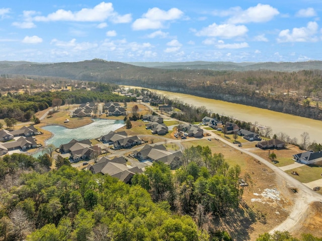 drone / aerial view with a residential view and a mountain view