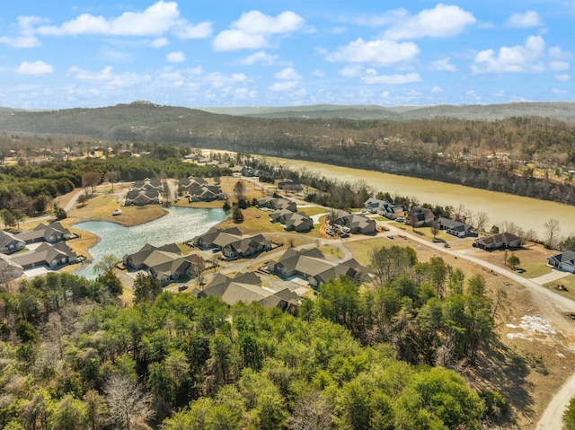 bird's eye view with a water view and a residential view