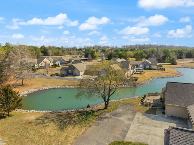 aerial view with a water view and a residential view