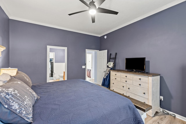 bedroom featuring ornamental molding, ceiling fan, baseboards, and wood finished floors