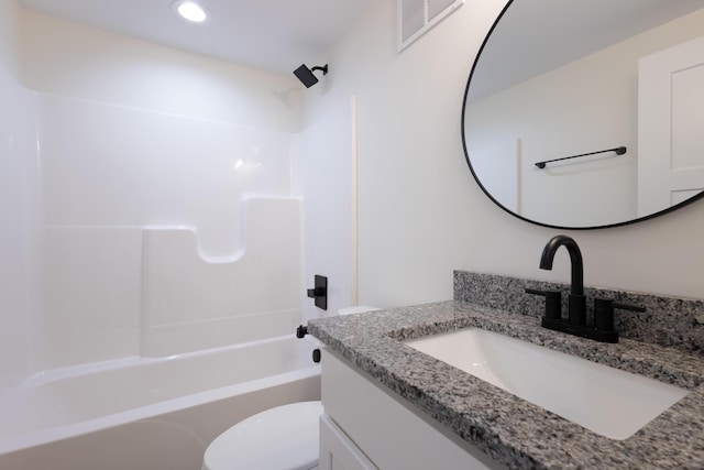 full bathroom featuring toilet, recessed lighting, vanity, visible vents, and tub / shower combination