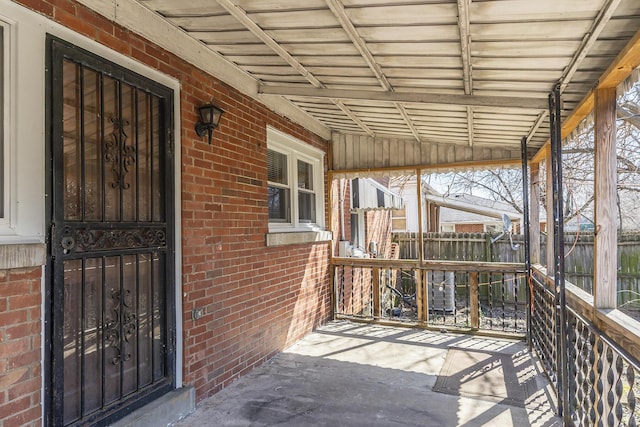 view of patio / terrace with fence