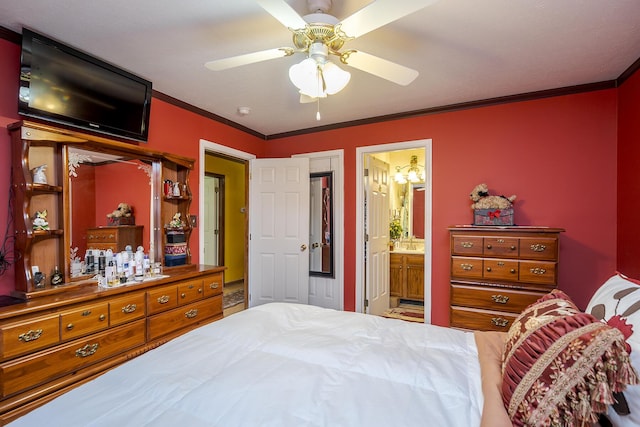 bedroom with a ceiling fan, ensuite bath, and crown molding