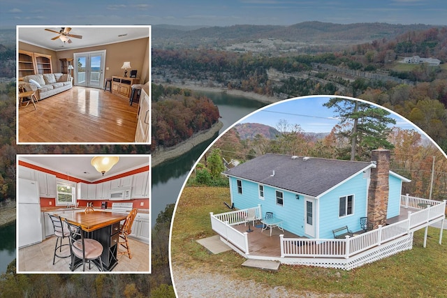 birds eye view of property featuring a wooded view