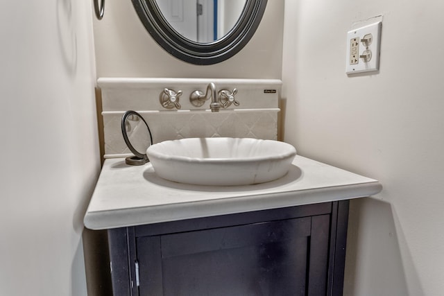 interior details featuring tasteful backsplash and vanity