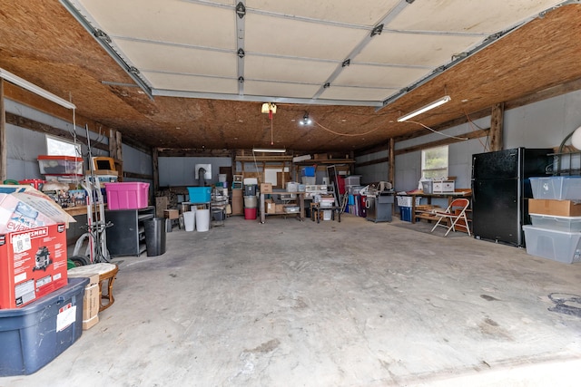 garage featuring freestanding refrigerator