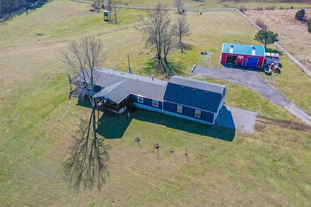 birds eye view of property featuring a rural view