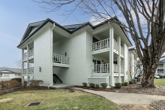 view of building exterior with cooling unit