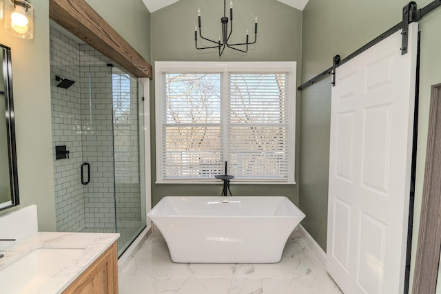 full bath featuring vanity, baseboards, a freestanding bath, marble finish floor, and a shower stall