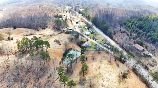 bird's eye view featuring a view of trees