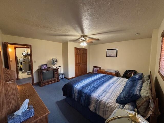 bedroom featuring a textured ceiling, carpet floors, a ceiling fan, and baseboards