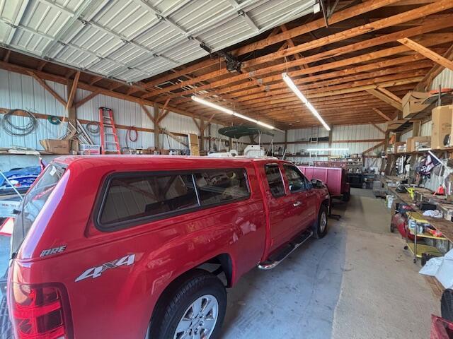 garage featuring metal wall