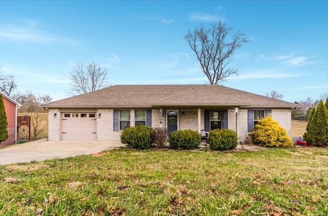 ranch-style home featuring a garage, concrete driveway, brick siding, and a front yard