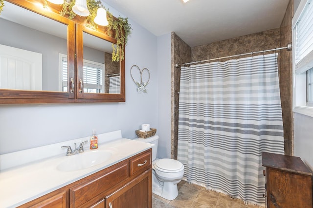 full bath featuring curtained shower, vanity, and toilet