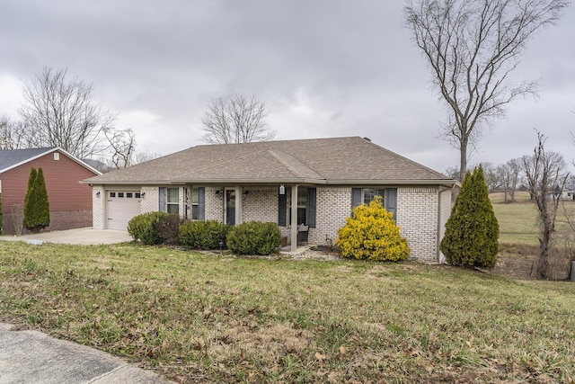 single story home featuring a shingled roof, concrete driveway, an attached garage, a front lawn, and brick siding