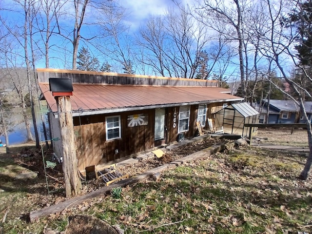 view of front of house with metal roof