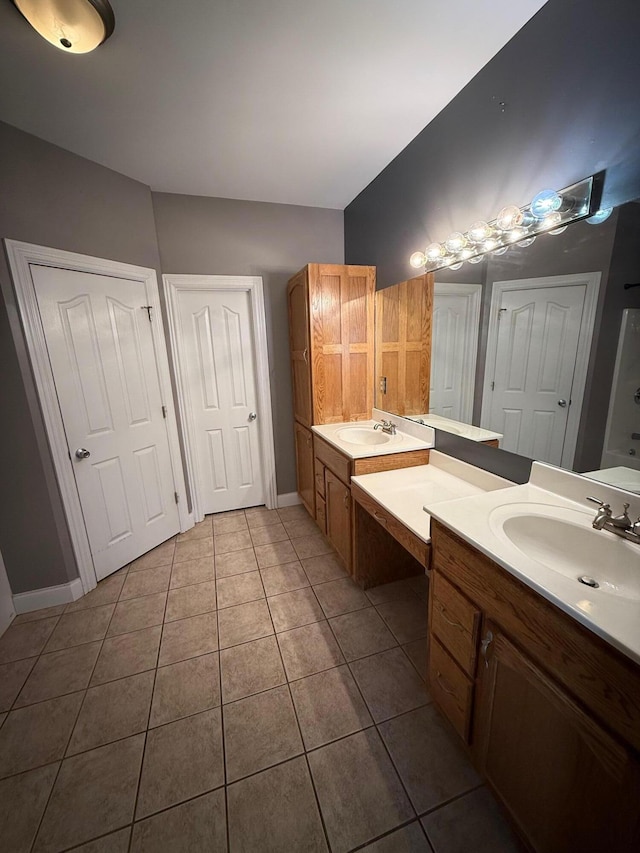 bathroom with vanity and tile patterned floors