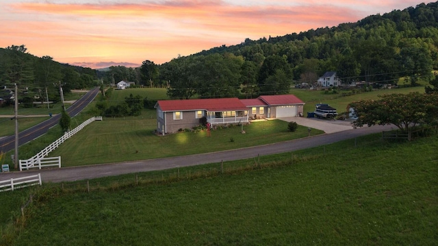 aerial view featuring a forest view