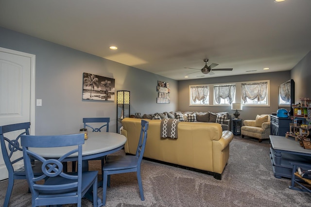 carpeted living room with ceiling fan and recessed lighting