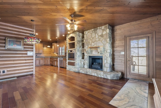 unfurnished living room with wooden ceiling, ceiling fan, wood finished floors, log walls, and a fireplace