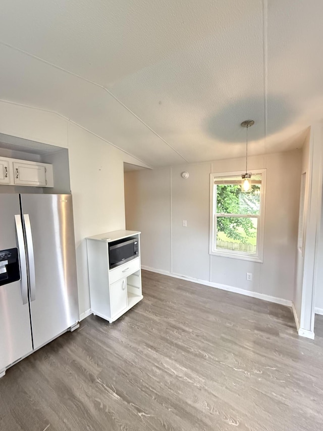 71 Pike St, Brodhead, KY 40409 - kitchen featuring stainless steel appliances, wood finished floors, white cabinetry, baseboards, and decorative light fixtures