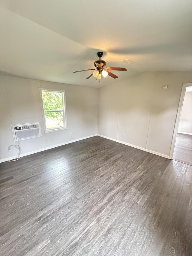 71 Pike St, Brodhead, KY 40409 - unfurnished room with a wall mounted air conditioner, a ceiling fan, dark wood-type flooring, and baseboards