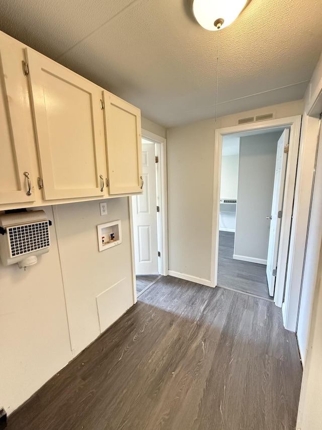71 Pike St, Brodhead, KY 40409 - clothes washing area featuring cabinet space, hookup for a washing machine, dark wood finished floors, baseboards, and a textured ceiling