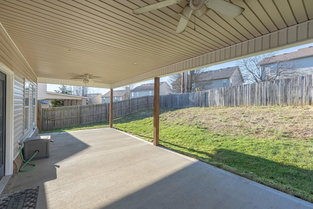 view of patio featuring a fenced backyard and ceiling fan