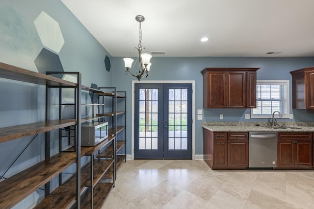 kitchen featuring visible vents, a sink, light stone counters, stainless steel dishwasher, and french doors