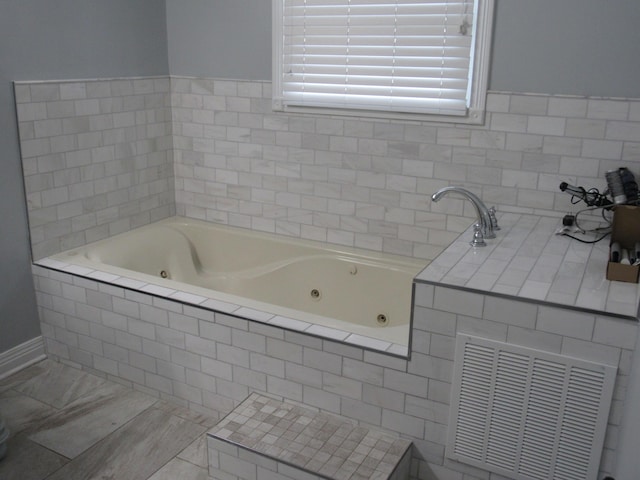 bathroom featuring a whirlpool tub