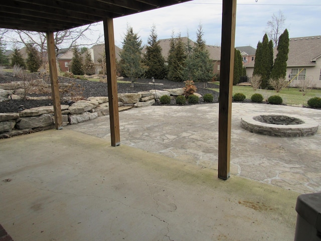 view of patio / terrace featuring an outdoor fire pit