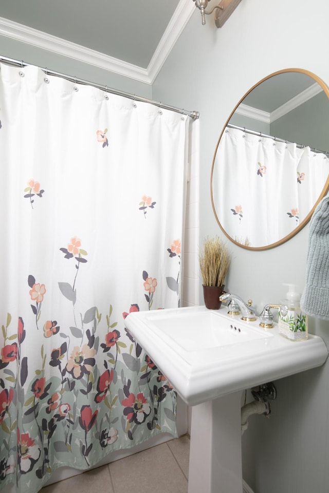 bathroom featuring tile patterned flooring and ornamental molding