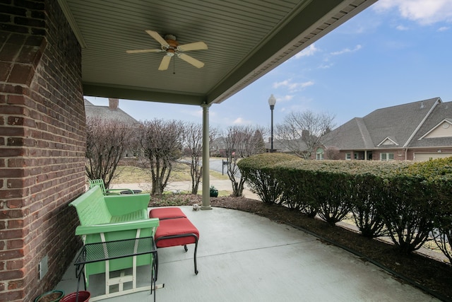 view of patio featuring a ceiling fan