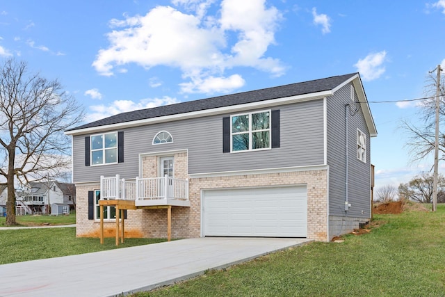 1000 Indian Trl, Lawrenceburg, KY 40342 - raised ranch with a front lawn, brick siding, a garage, and driveway