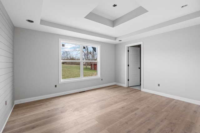 1000 Indian Trl, Lawrenceburg, KY 40342 - empty room with light wood-type flooring, a tray ceiling, baseboards, and visible vents