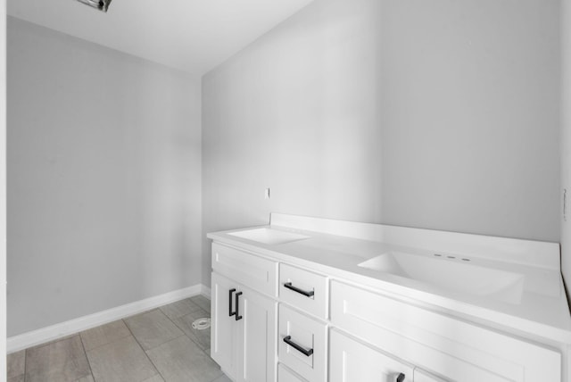 1000 Indian Trl, Lawrenceburg, KY 40342 - bathroom with tile patterned flooring, baseboards, and a sink