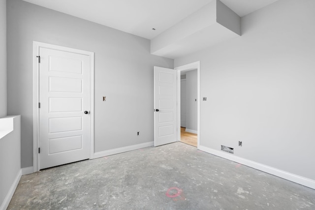1000 Indian Trl, Lawrenceburg, KY 40342 - unfurnished bedroom featuring baseboards and concrete floors